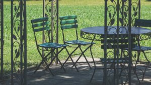 garden chairs in the shade thanks to an awning